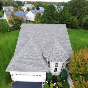 New gray shingle roof on a large home by roofing companies in Middletown Township, NJ.