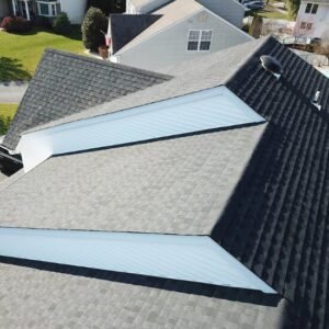 Close-up view of a new shingle roof installed by roofers near me.