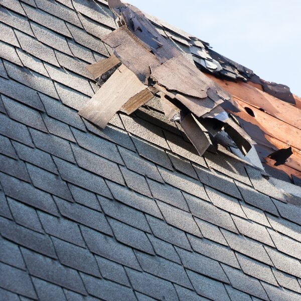 Roof damaged by a storm needing a roofing contractor in Middletown, NJ.