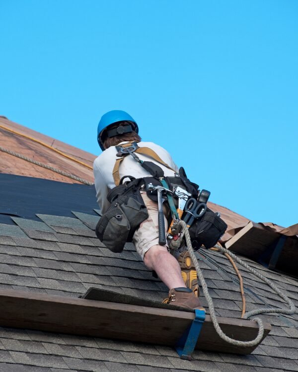 Roofing contractor installing a new roof in Middletown, NJ.